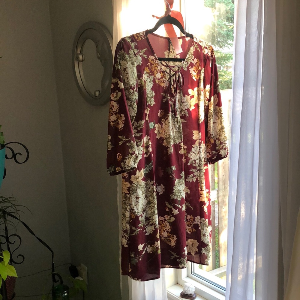 Stradivarius Floral swing dress with tie neck line